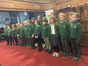 pupils in the Chapel singing carols.
