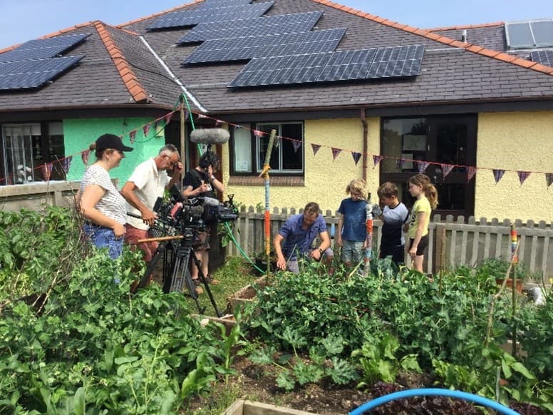 Filming crew filming the garden
